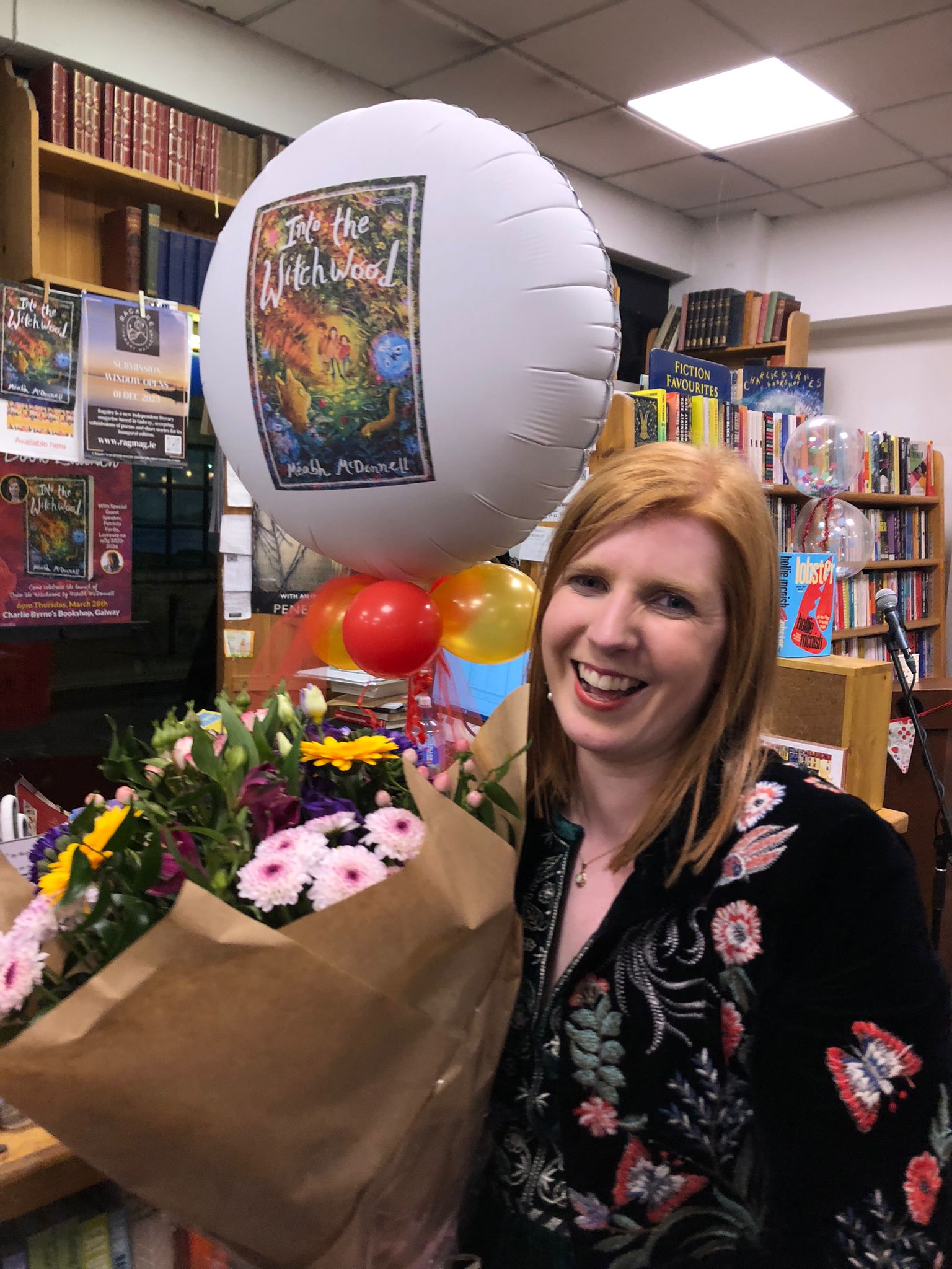 Meabh with baloon with book cover picture